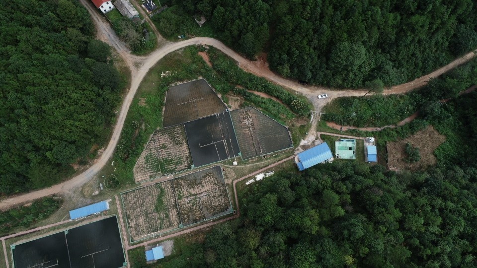 1779959145464733.jpg 定南石陂角稀土矿山尾水收集处理站(1).jpg